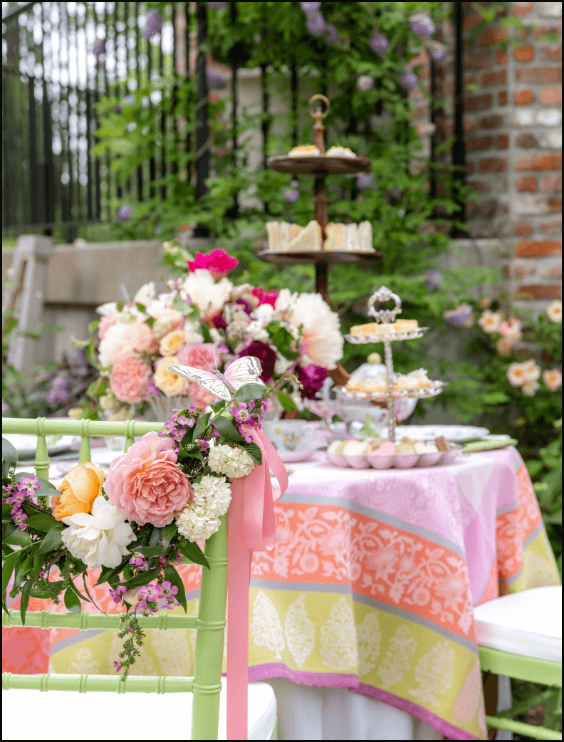 table with flowers and deserts