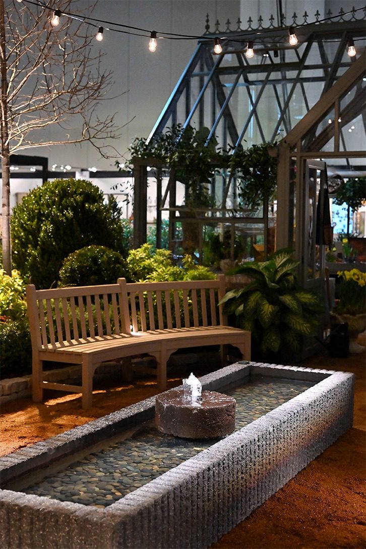table with flowers and deserts